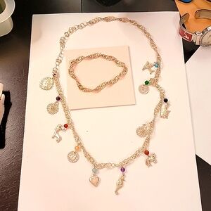 Spiral Dna Singapore style necklace and bracelet set.Charms Peruvian